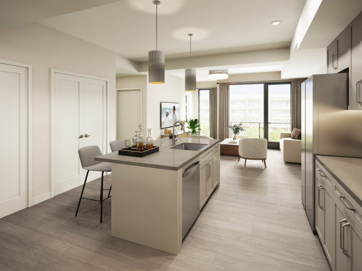 Bright and spacious living area with modern kitchen, comfortable seating, and natural light.