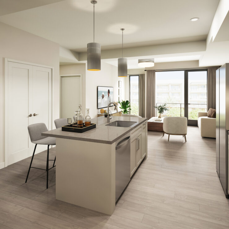 Bright and spacious living area with modern kitchen, comfortable seating, and natural light.