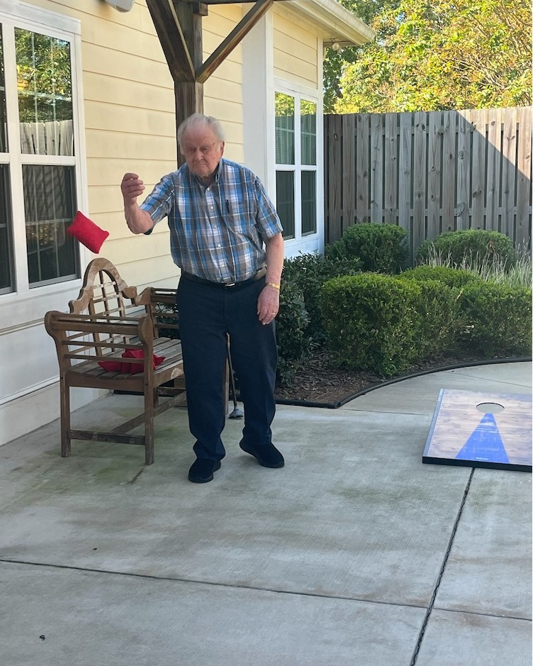 Residents are practicing for their Corn hole League competition ⛳️!