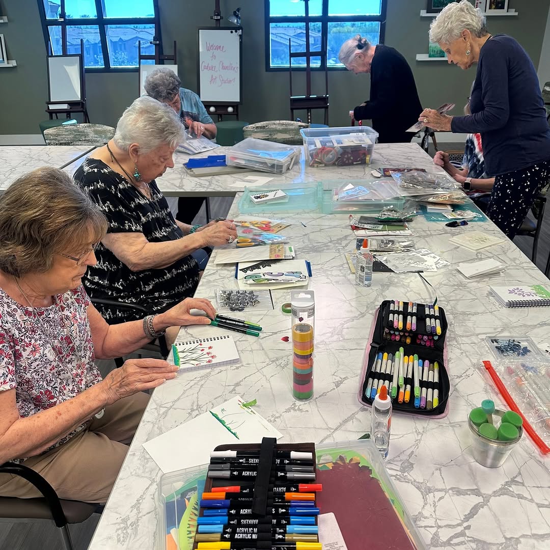 Our residents spent the afternoon transforming plain notebooks into beautiful, one-of-a-kind creations using colorful papers, stickers, ribbons, and plenty of imagination. Each notebook became a unique reflection of its creator’s personality and style! Crafting is a wonderful way to encourage creativity, fine motor skills, and self-expression—and it’s even more fun when shared with friends. We loved seeing everyone’s artistic talents shine! #CadenceChandler #CreativeAging #SeniorLiving #ArtsAndCrafts #MakingMemories #LifeEnriched