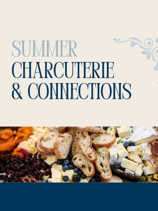 A vibrant charcuterie board with breads, cheeses, fruits, and nuts, inviting warm community gatherings.