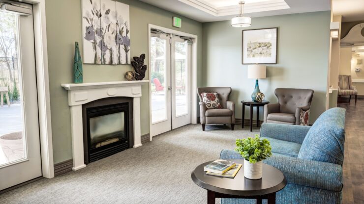Bright and inviting lounge with comfortable seating and calming decor for socializing and relaxation.