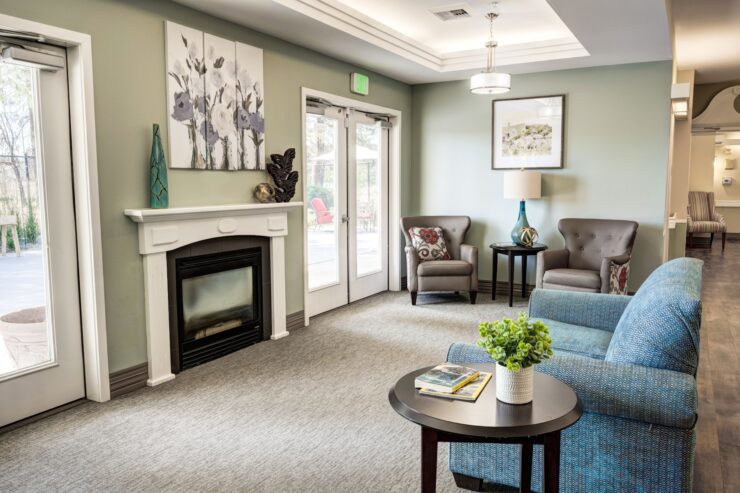 Bright and inviting lounge with comfortable seating and calming decor for socializing and relaxation.