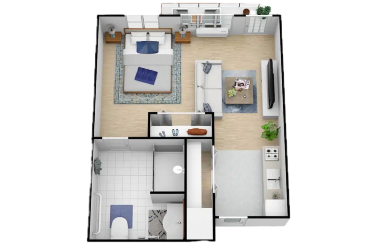 Bright and open studio apartment with comfortable living, sleeping, and kitchen areas for independent living.