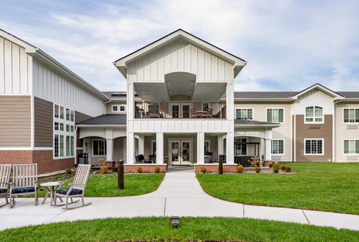 Well-maintained retirement community with inviting outdoor seating and spacious porches.