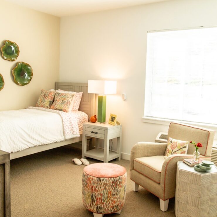 Bright and welcoming private room with comfortable seating and tasteful decor for relaxed living.