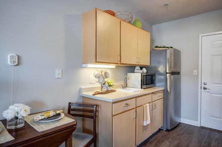 Bright, inviting kitchen and dining area with modern appliances and thoughtful decor for comfortable living.