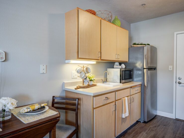 Bright, inviting kitchen and dining area with modern appliances and thoughtful decor for comfortable living.
