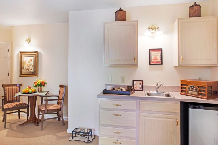 Bright, inviting kitchen and dining nook with warm lighting and welcoming seating for shared moments.