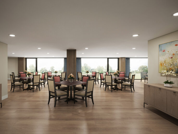 Bright dining area with floral centerpieces, large windows, and comfortable seating for residents.