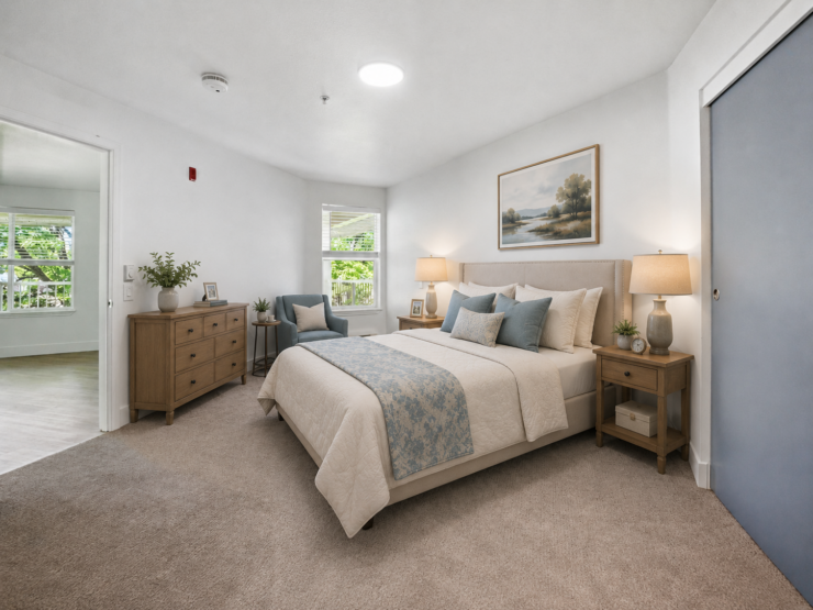 Bright and inviting bedroom with ample natural light, comfortable furnishings, and serene decor.
