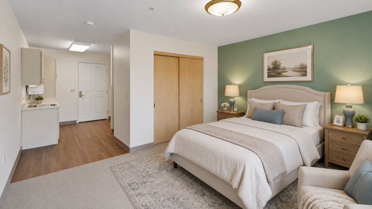 Elegant, inviting retirement suite with soft lighting, warm wood tones, and peaceful decor.