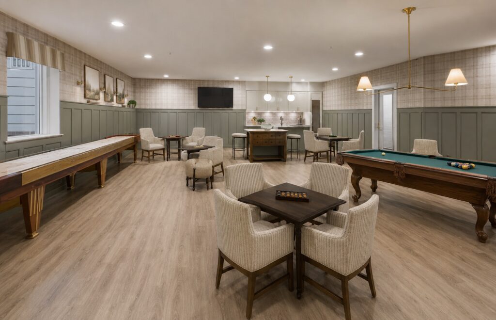 Relaxing game room with card tables, shuffleboard, and pool table for social gatherings.