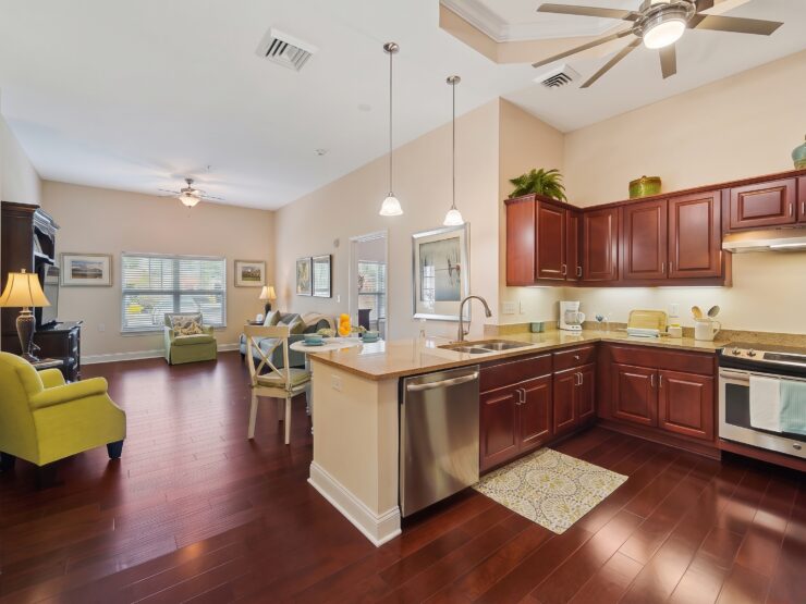 Spacious kitchen and living area with warm wood floors and inviting seating for gatherings.