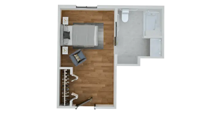 Bright and accessible living space with bedroom, seating area, and private bathroom for comfort and ease.