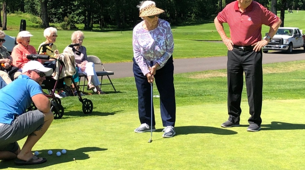 Residents playing golf