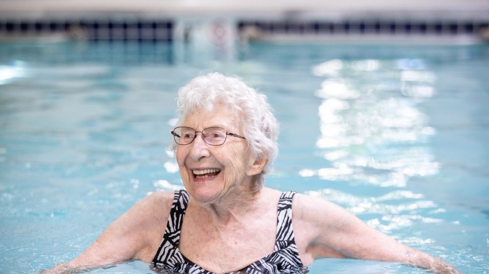 Senior woman swimming in a pool